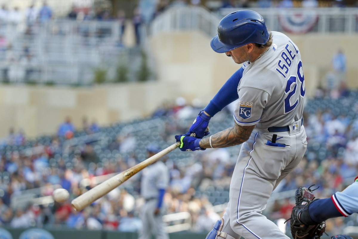 Sep 12, 2021; Minneapolis, Minnesota, USA; Kansas City Royals center fielder Kyle Isbel (28) hits an RBI single against the Minnesota Twins in the eighth inning at Target Field. Mandatory Credit: Bruce Kluckhohn-USA TODAY Sports